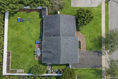 an aerial view of a house with garden