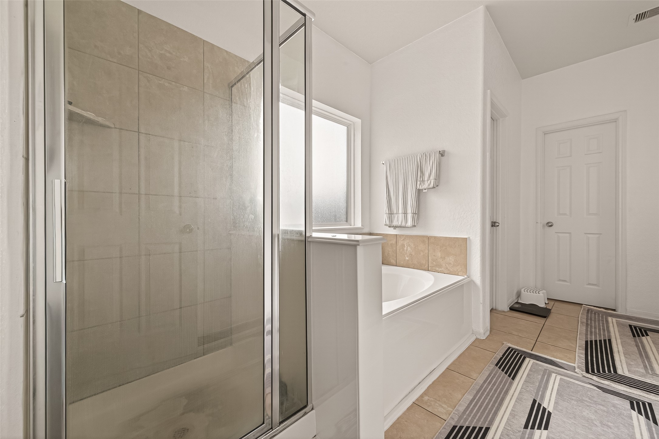 18303 All Oak Trail Houston, TX 77084 - Photo 14 of 31 a bathroom with a tub shower and sink