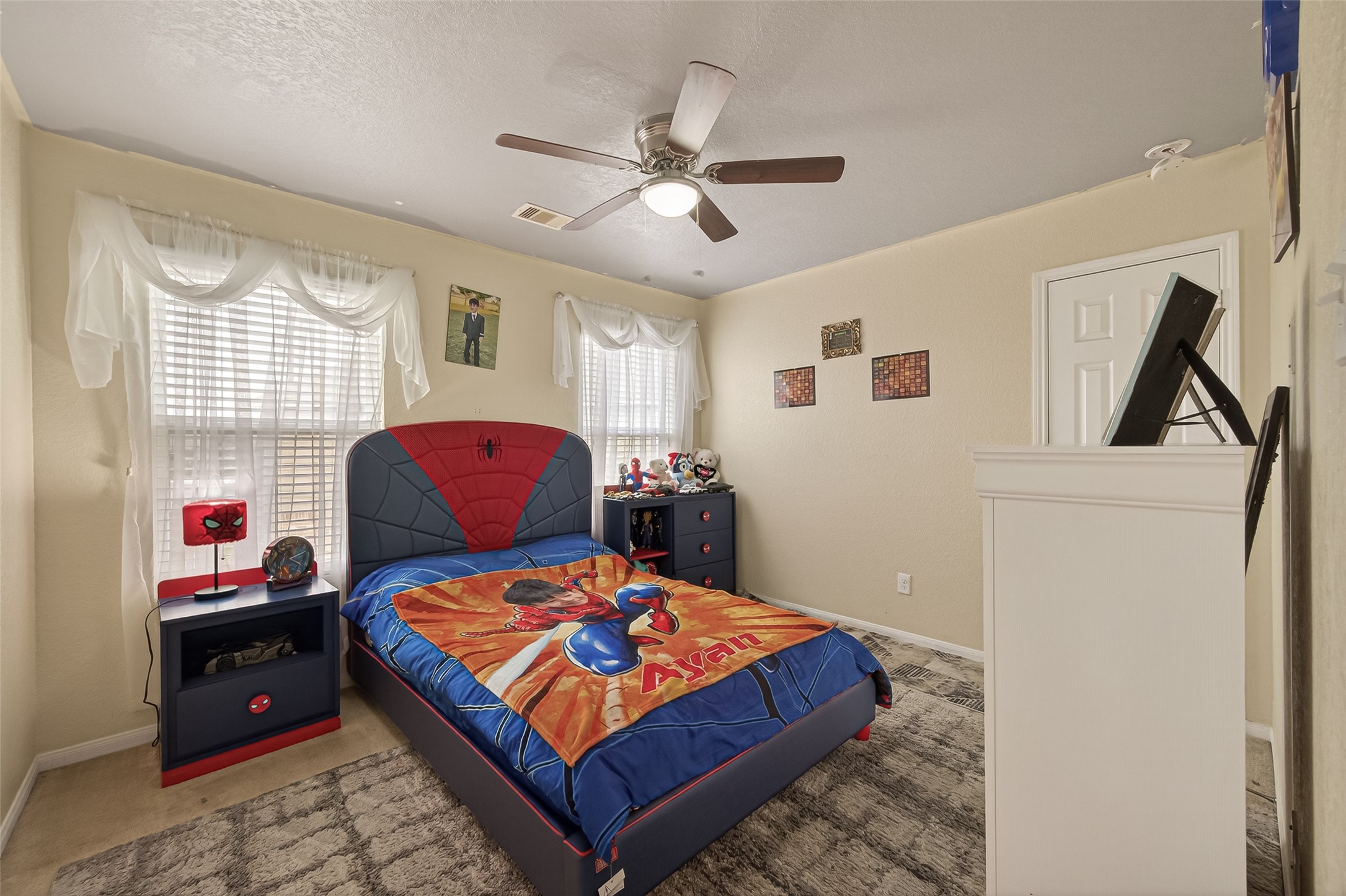 18303 All Oak Trail Houston, TX 77084 - Photo 25 of 31 a bedroom with a bed and wooden floor