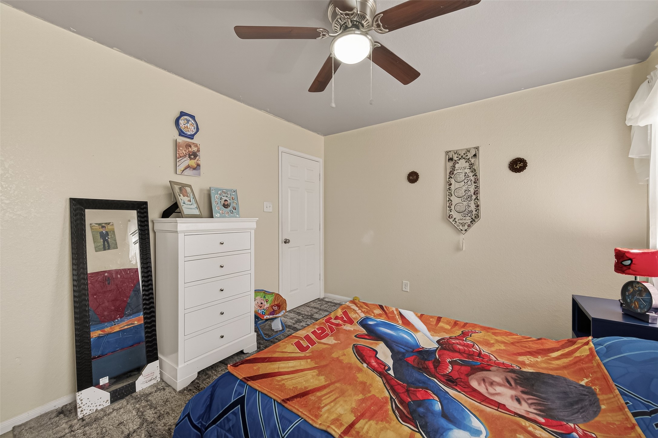 18303 All Oak Trail Houston, TX 77084 - Photo 26 of 31 a bedroom with a bed and cabinets