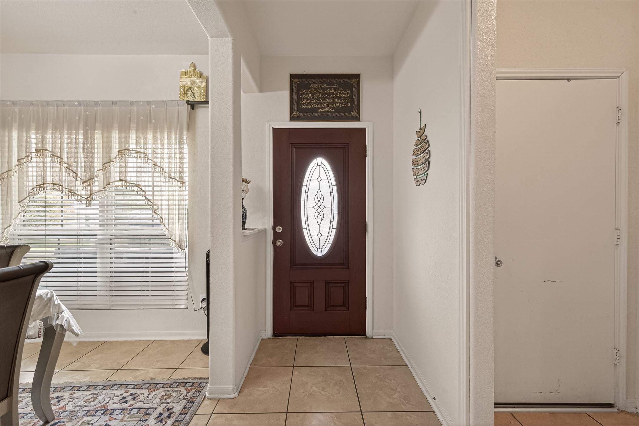 18303 All Oak Trail Houston, TX 77084 - Photo 3 of 31 a view of entryway with wooden floor
