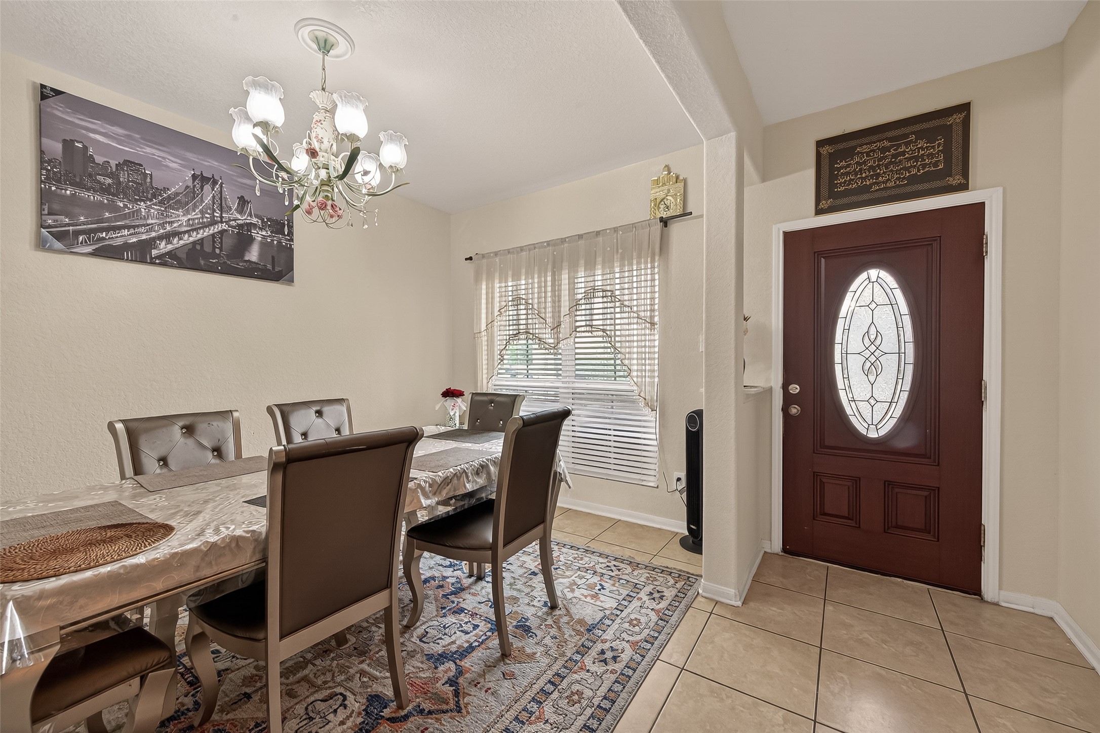 18303 All Oak Trail Houston, TX 77084 - Photo 4 of 31 a view of a dining room with furniture window and wooden floor