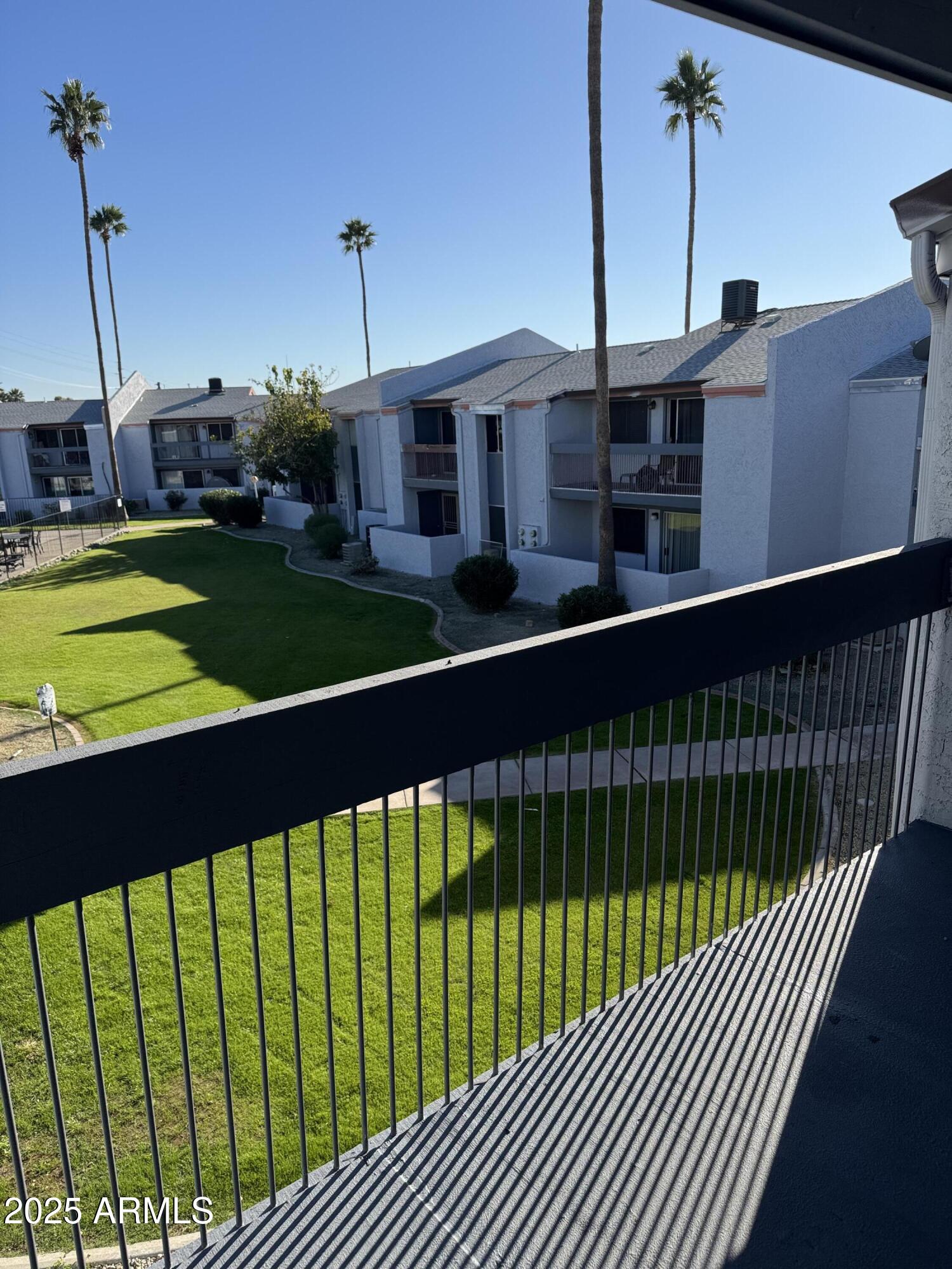 7550 North 12th Street, Unit 239 Phoenix, AZ 85020 - Photo 2 of 14 a view of a house and a roof deck