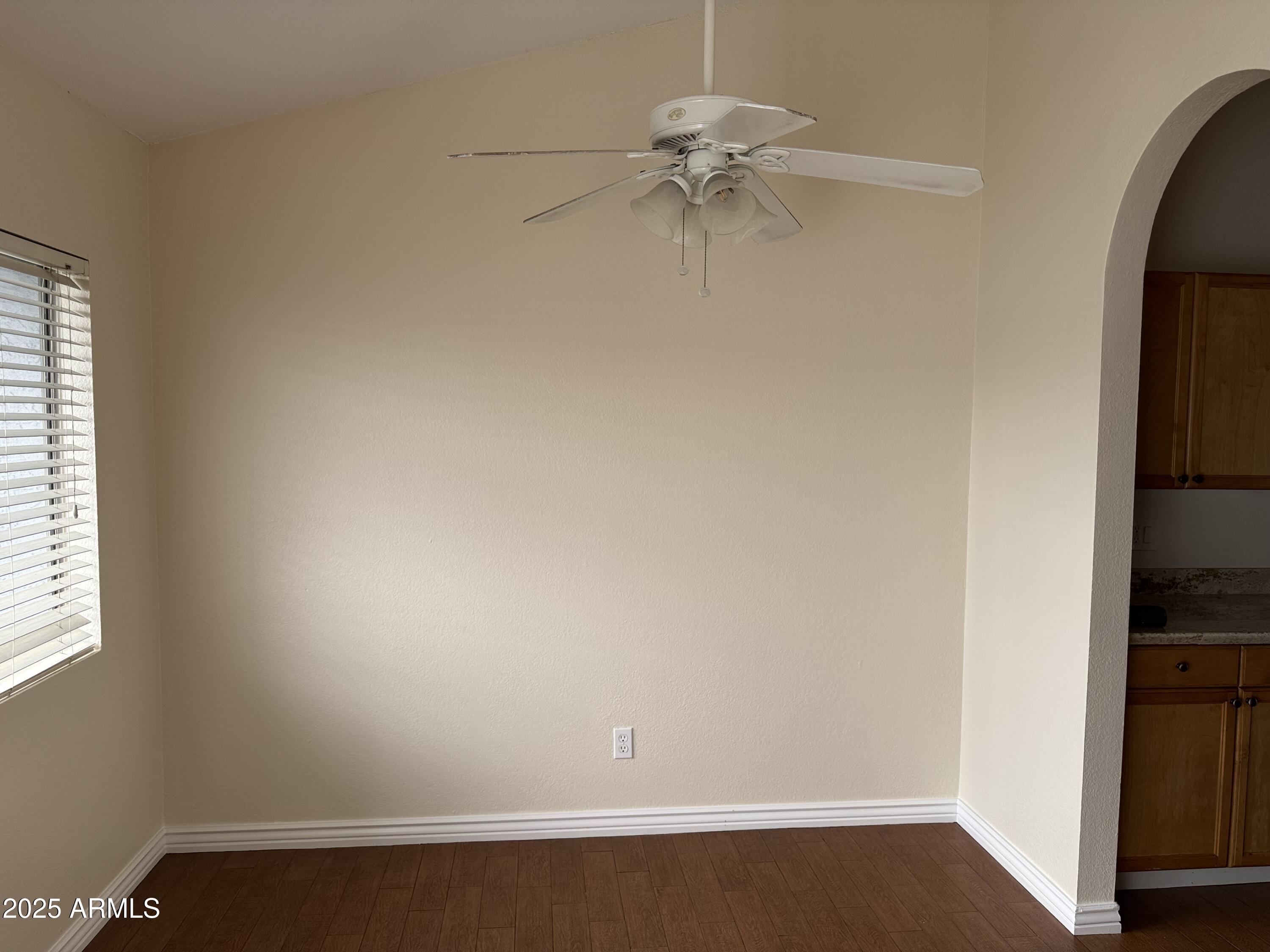 7550 North 12th Street, Unit 239 Phoenix, AZ 85020 - Photo 8 of 14 an empty room with a window