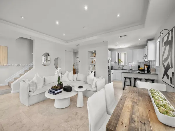 a living room with furniture and a table