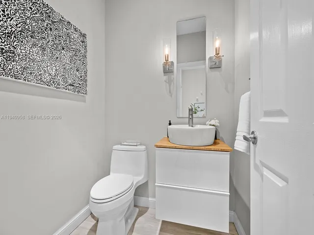 a bathroom with a sink and a toilet