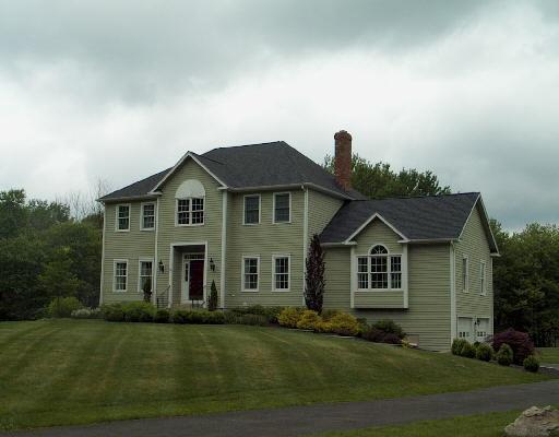 22 Huntingtown Road Monroe, CT 06468 - Photo 1 of 1 a front view of a house with a garden