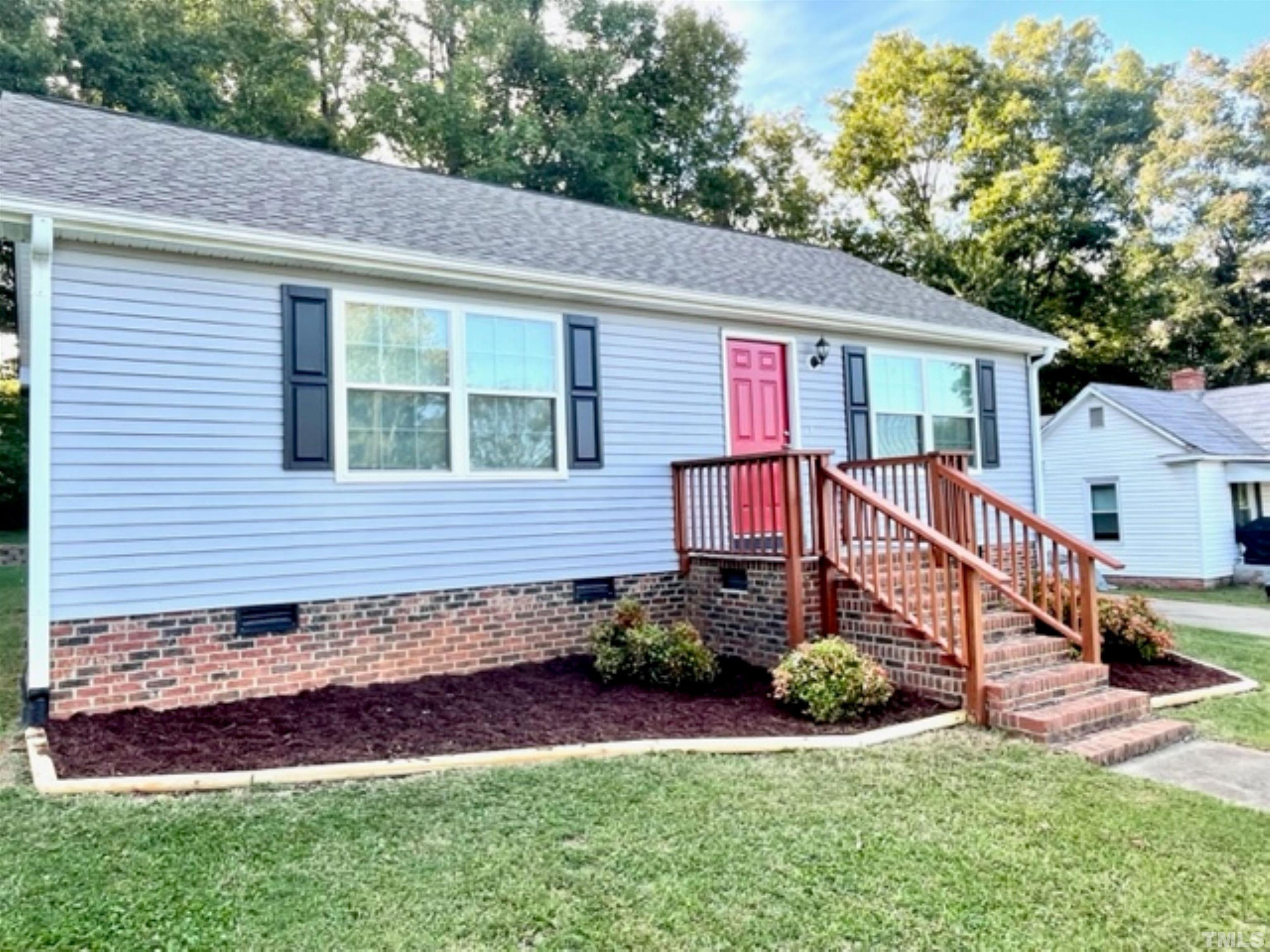 1323 Pointer Street Roxboro, NC 27573 - Photo 23 of 51 front view of a house with a yard