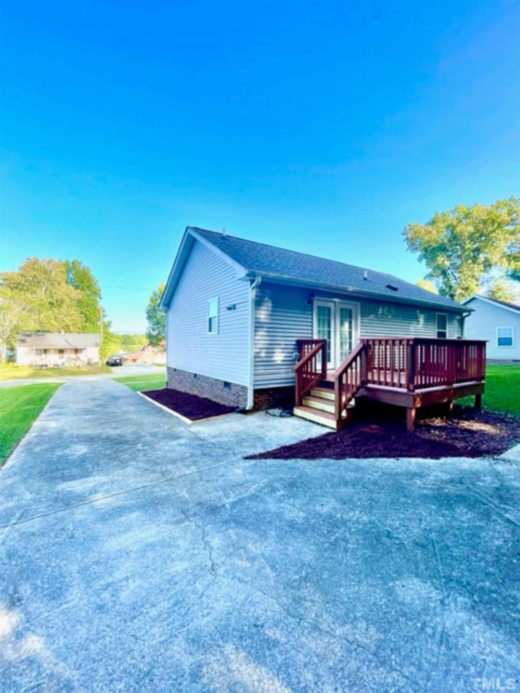 1323 Pointer Street Roxboro, NC 27573 - Photo 27 of 51 a view of yard with car parked