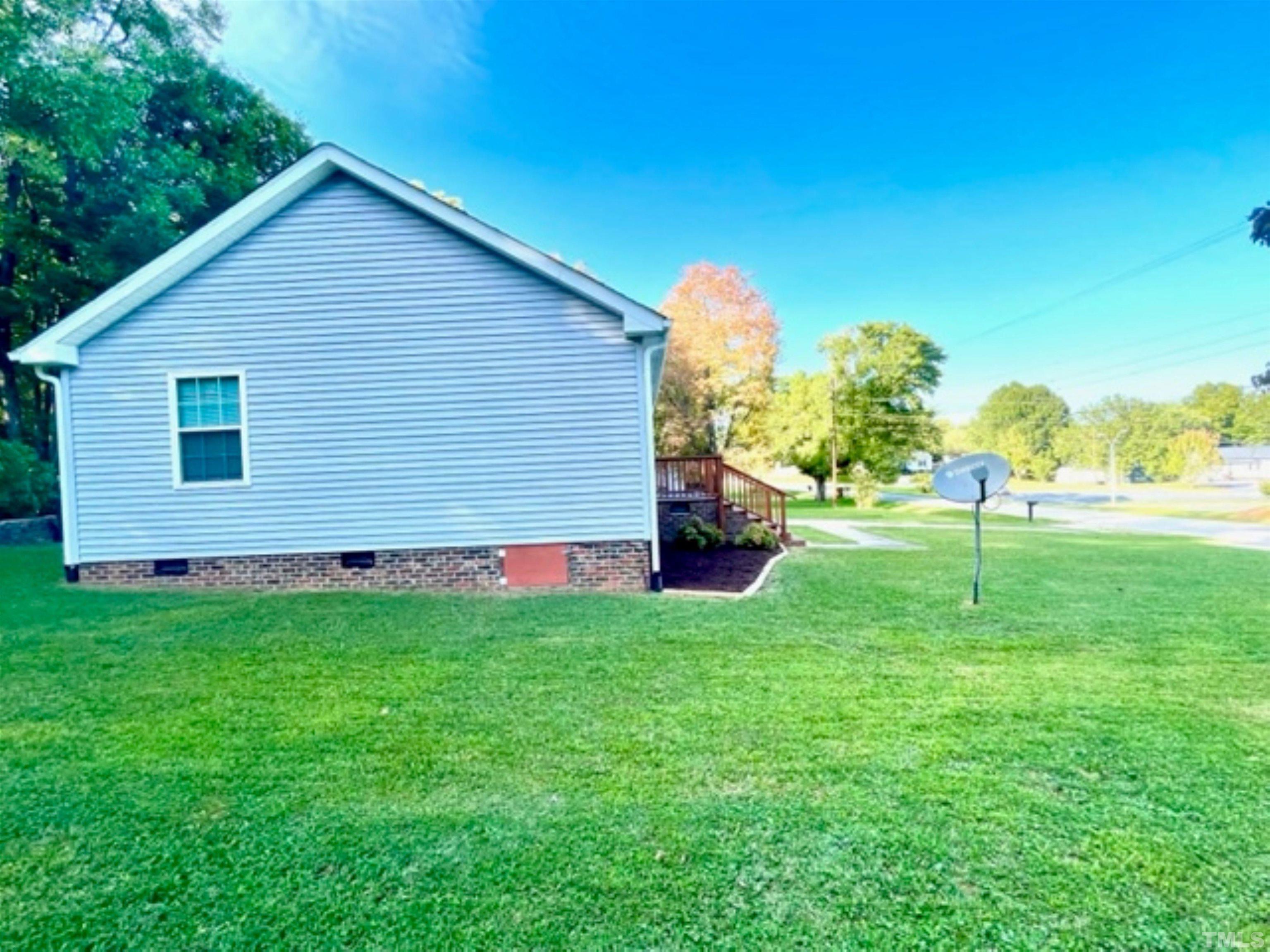 1323 Pointer Street Roxboro, NC 27573 - Photo 29 of 51 a view of a house with backyard