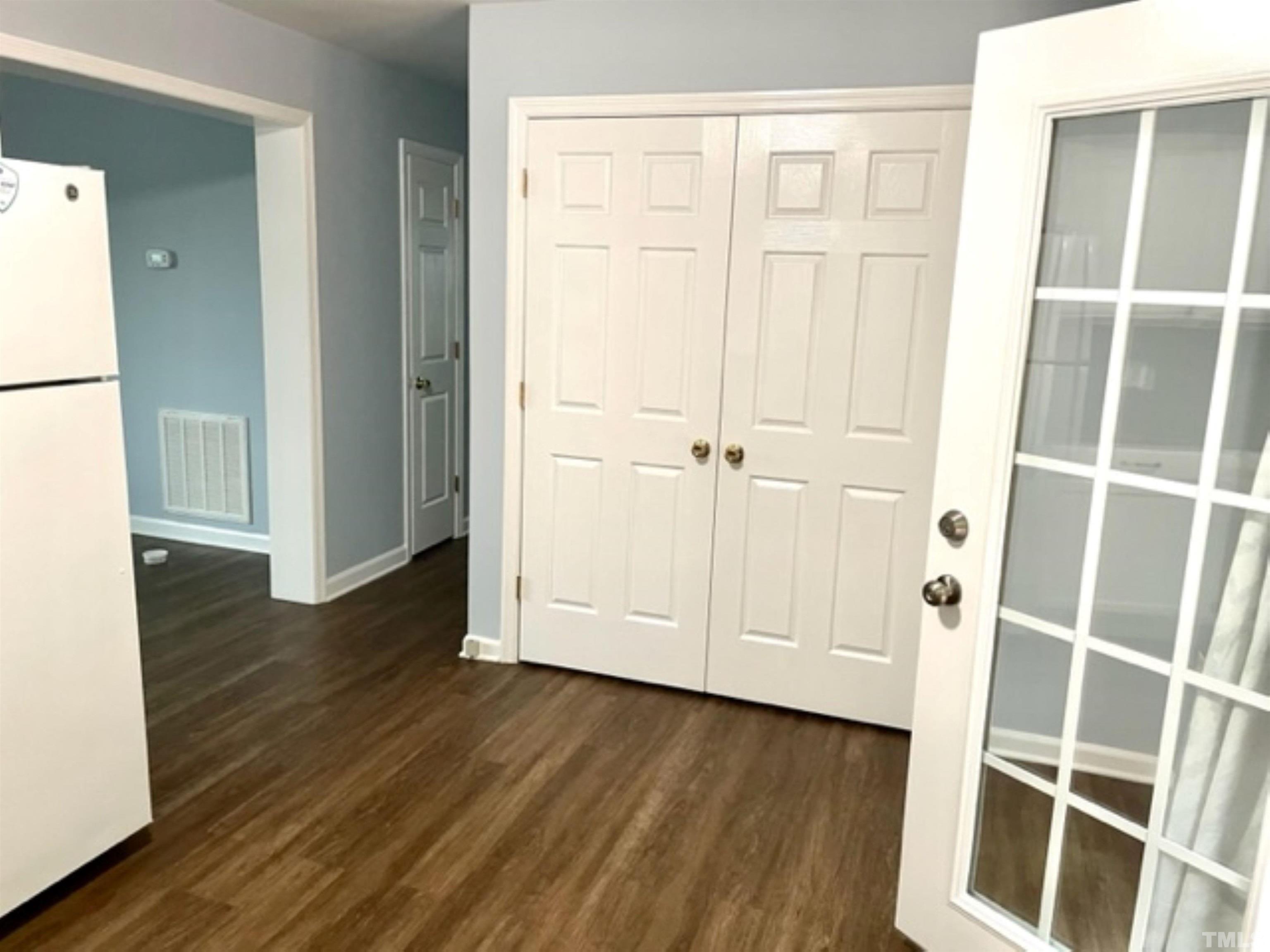 1323 Pointer Street Roxboro, NC 27573 - Photo 35 of 51 an empty room with wooden floor and closet