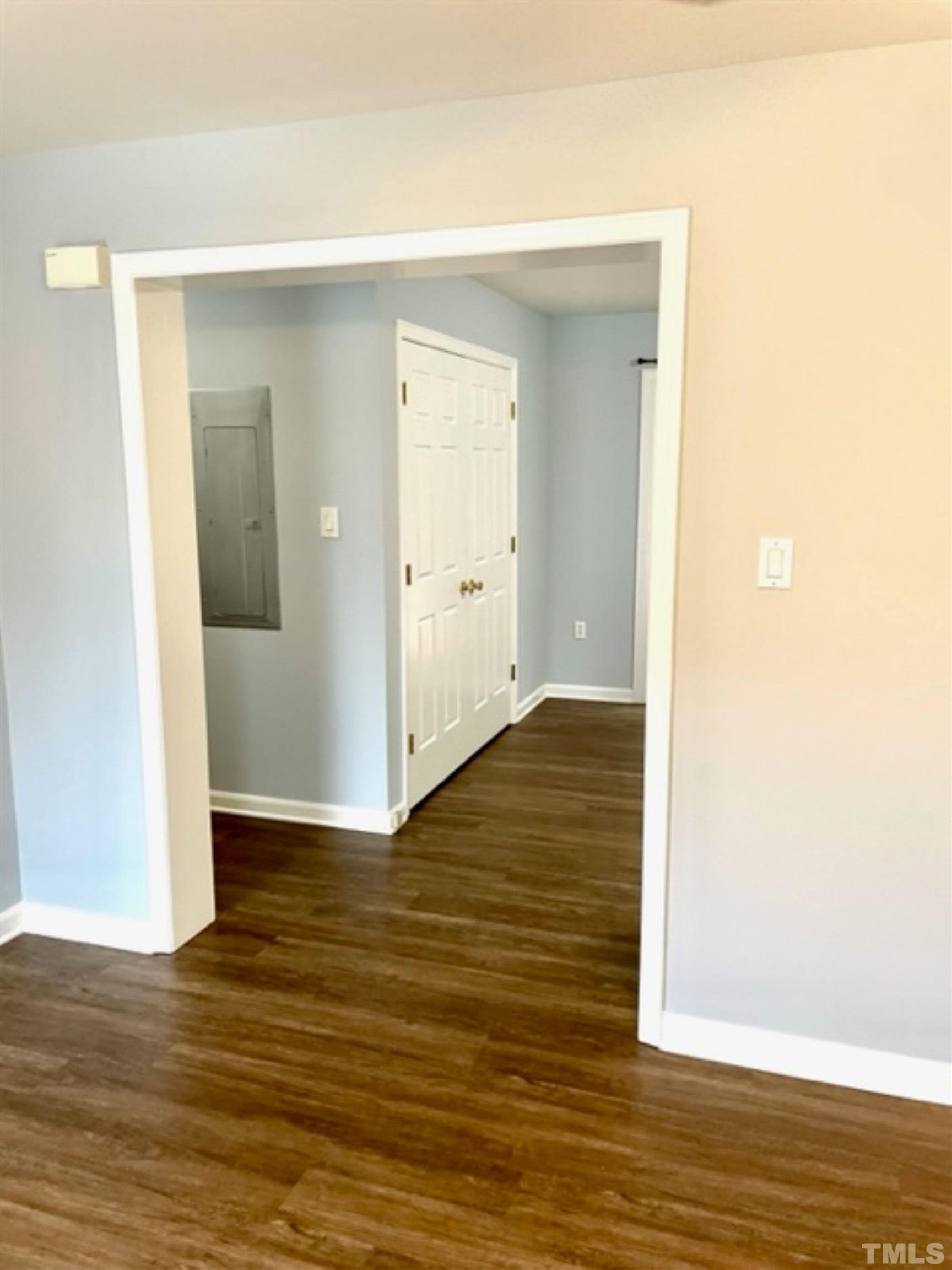 1323 Pointer Street Roxboro, NC 27573 - Photo 41 of 51 a view of an empty room with wooden floor