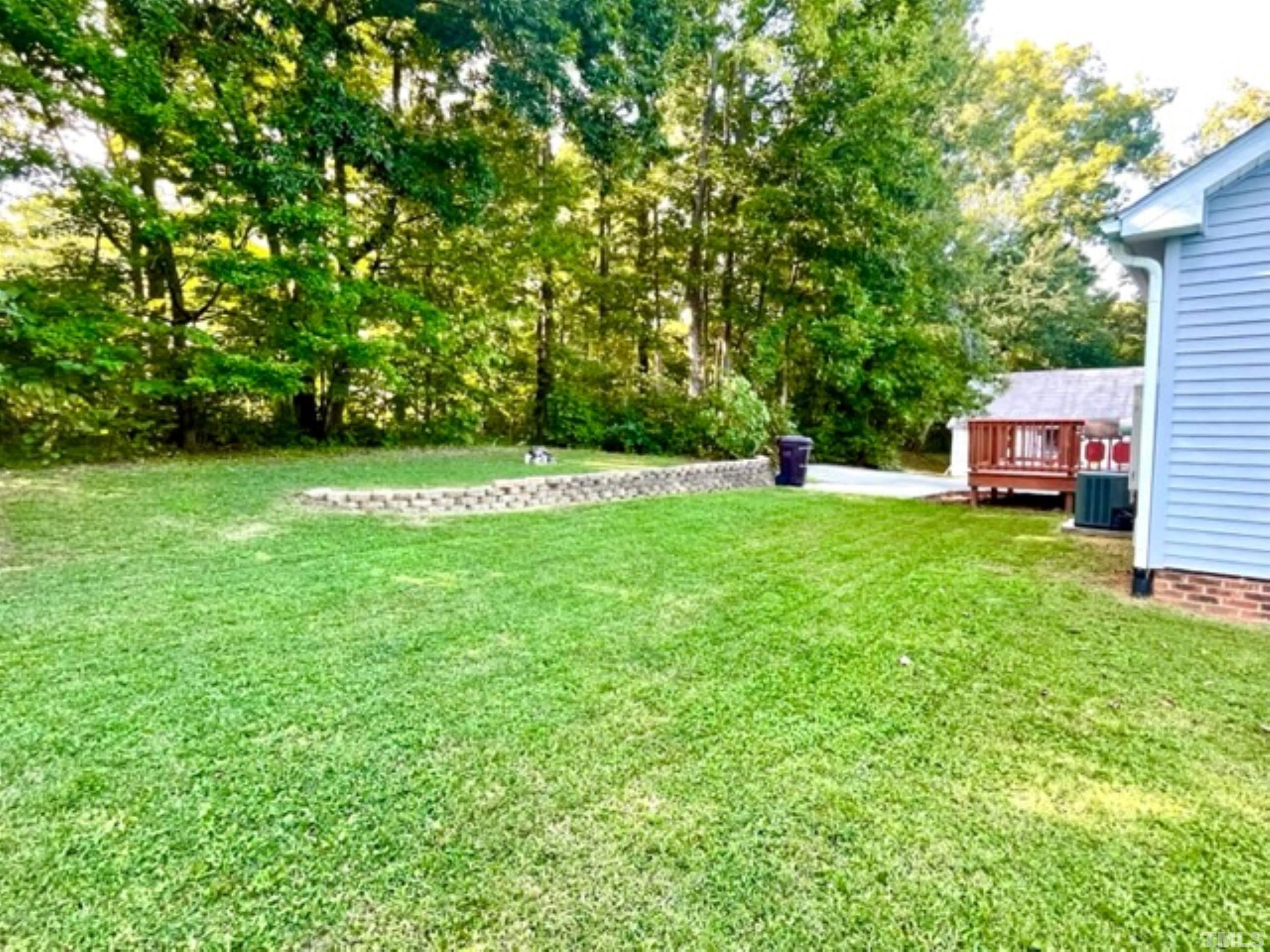 1323 Pointer Street Roxboro, NC 27573 - Photo 49 of 51 a view of a house with a backyard