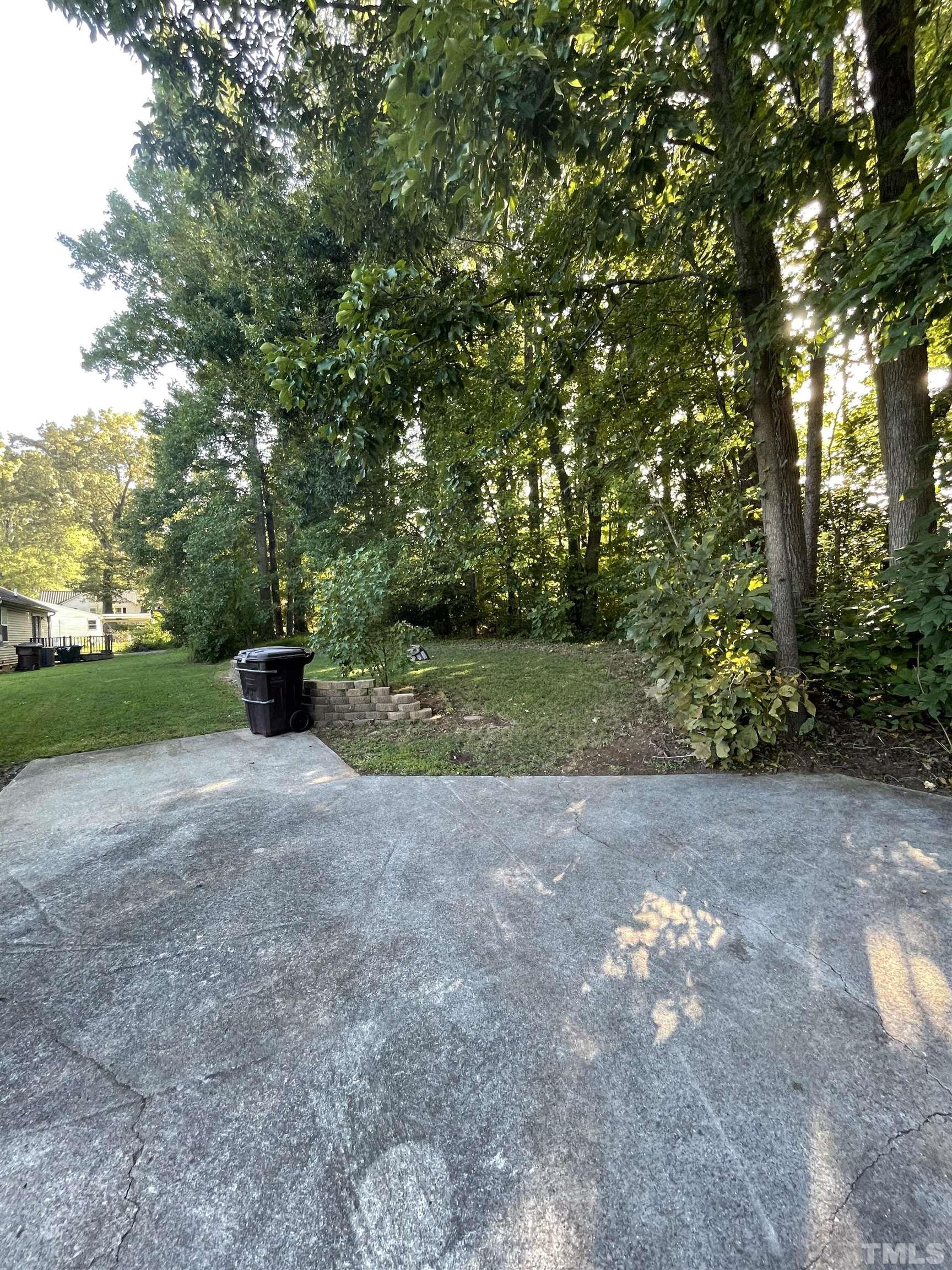 1323 Pointer Street Roxboro, NC 27573 - Photo 5 of 51 a view of a outdoor space with deck and yard