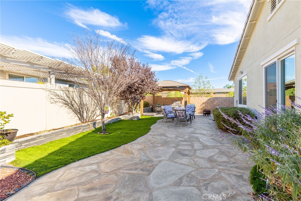 31094 Branches Circle Winchester, CA 92596 - Photo 22 of 32 a view of a patio with a yard
