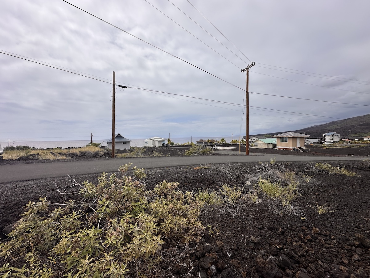 8 Akahi Avenue Captain Cook, HI 96704 - Photo 7 of 10 a view of a lake with a beach