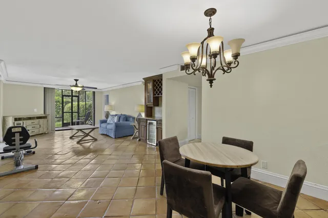a view of a livingroom with furniture and chandelier