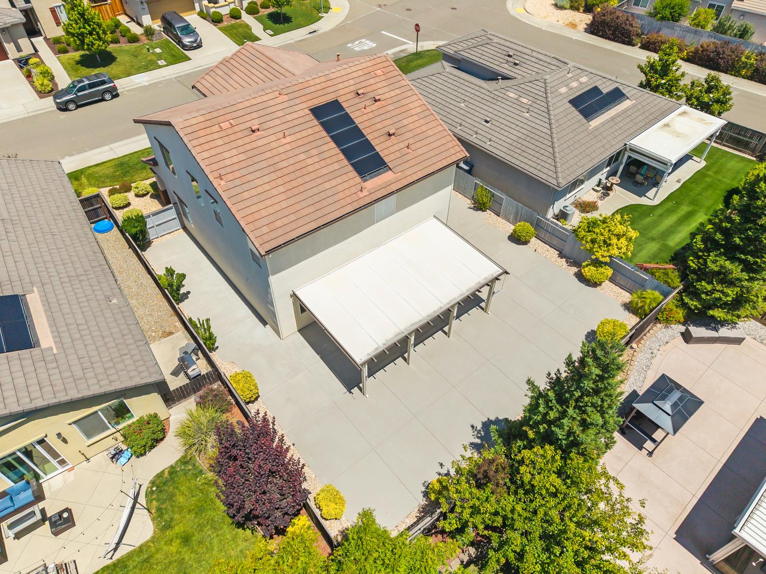 5453 Mossy Stone Way Rancho Cordova, CA 95742 - Photo 74 of 81 an aerial view of a house with a garden and deck