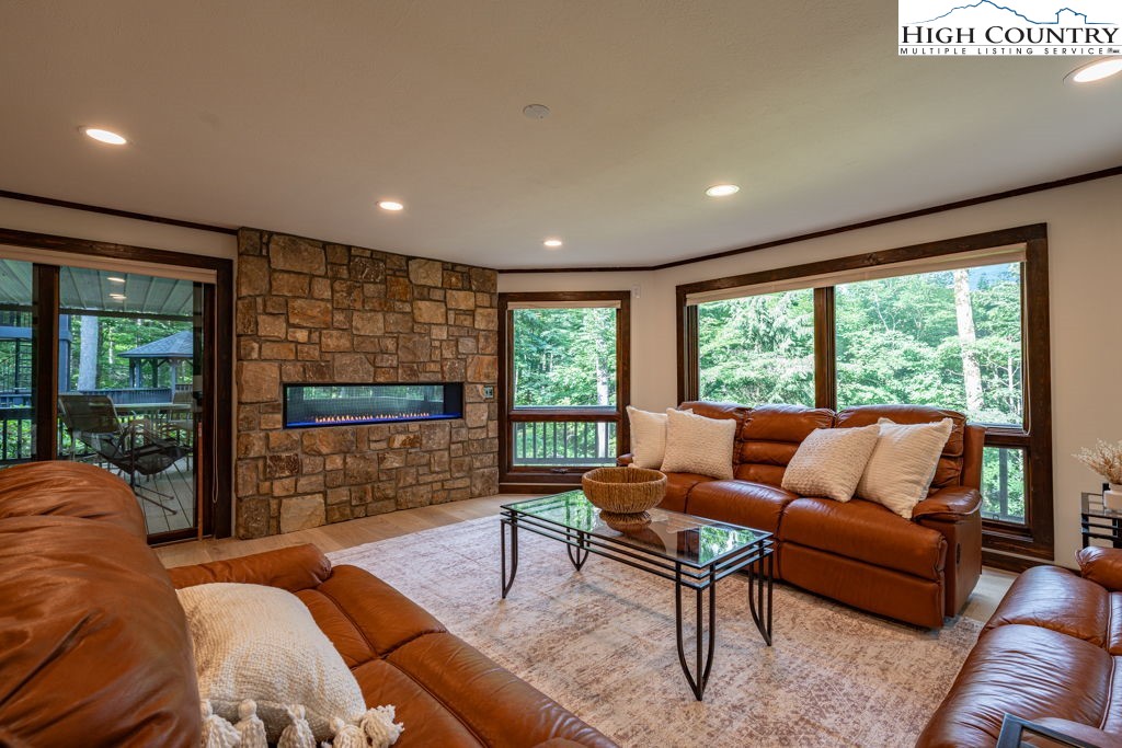 102 Ridge Drive Linville, NC 28646 - Photo 40 of 48 a living room with furniture and a large window