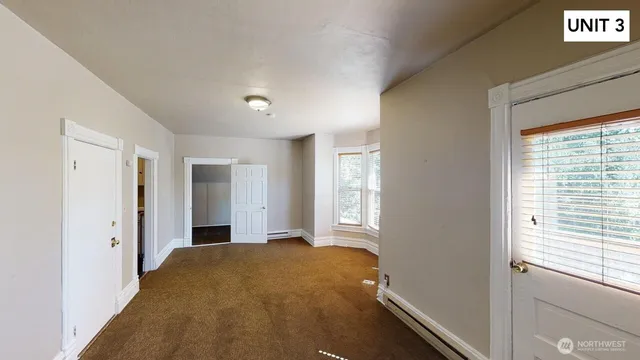 an empty room with windows