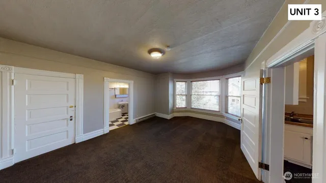 a view of livingroom with furniture and wooden floor