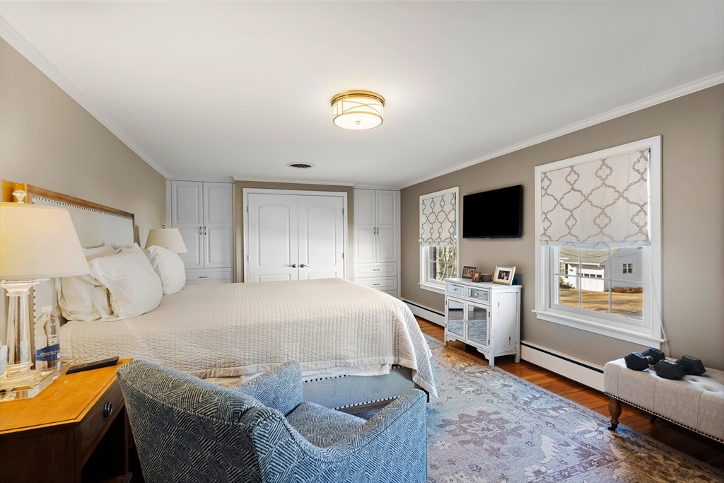 4 Dean Road Marblehead, MA 01945 - Photo 24 of 38 a bedroom with a bed and a flat screen tv