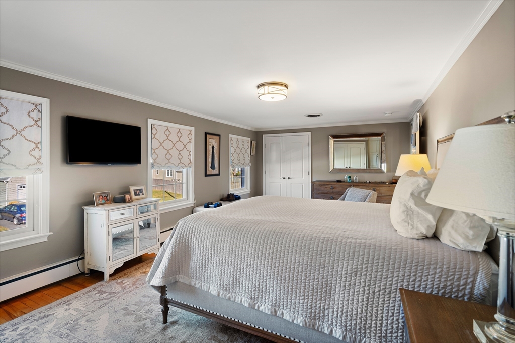 4 Dean Road Marblehead, MA 01945 - Photo 25 of 38 a bedroom with a bed and a flat screen tv