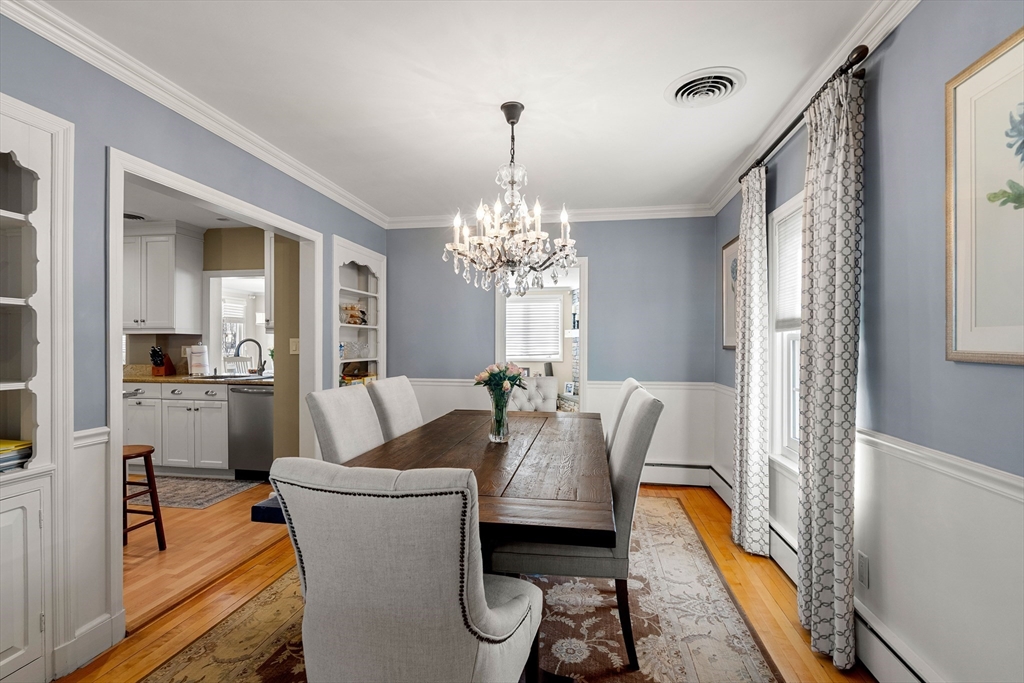 4 Dean Road Marblehead, MA 01945 - Photo 5 of 38 a dining room with furniture a chandelier and wooden floor