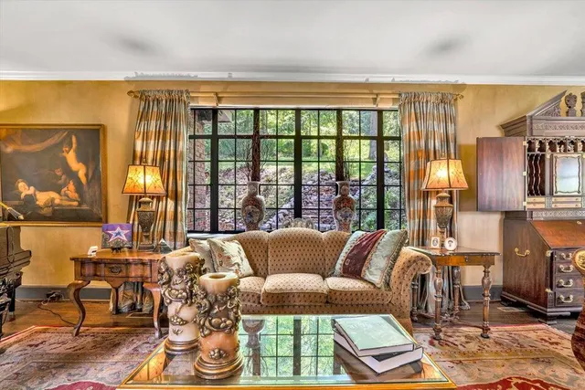 a kitchen filled with stainless steel appliances granite countertop a stove and refrigerator