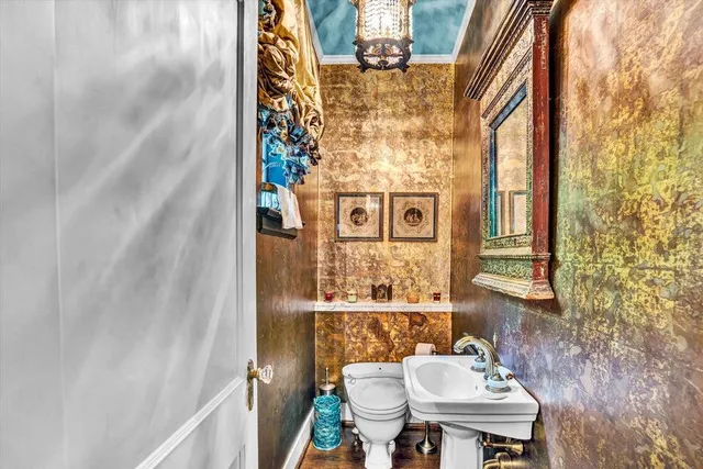 a living room with furniture fireplace and flat screen tv