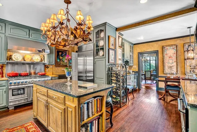 a bed room with a bed and glass windows