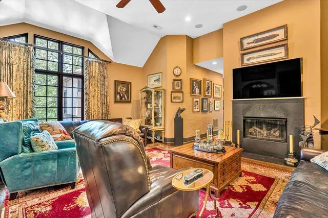 a bathroom with a granite countertop sink a mirror and a vanity