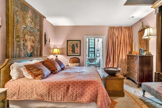 a view of balcony with furniture and garden