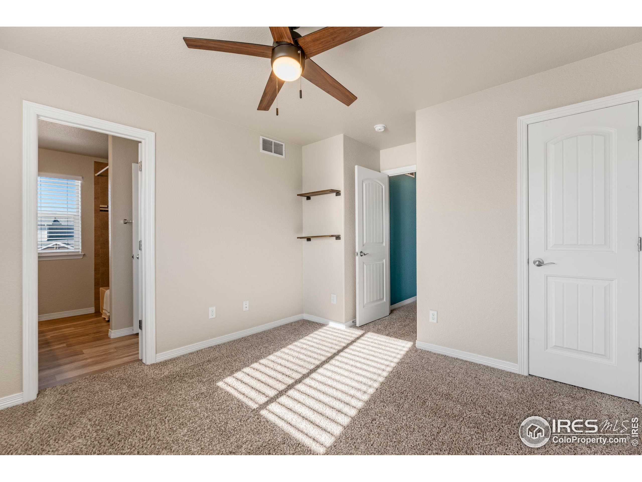 4527 Longmead Drive Windsor, CO 80550 - Photo 26 of 32 a view interior of a house and wooden floor
