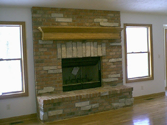 1290 Lake Summerset Road Lake Summerset, IL 61019 - Photo 2 of 8 a fireplace with a window