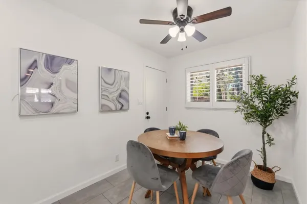 a bedroom with a bed and a desk