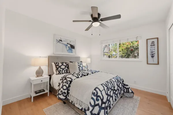 a workspace with furniture and a potted plant