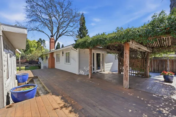 a view of a backyard with a small cabin