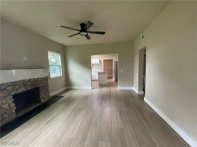 a bathroom with a bathtub and toilet