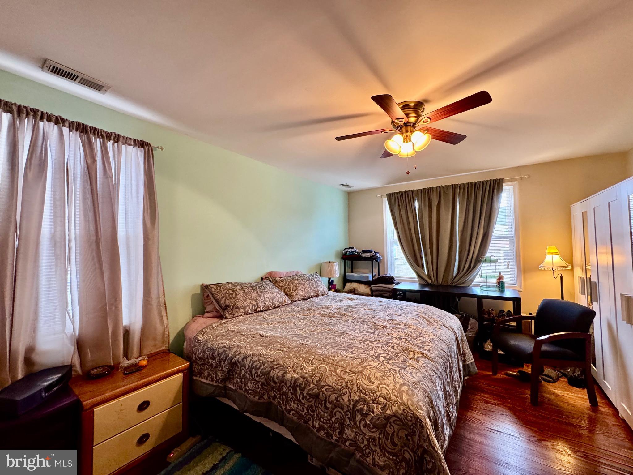 1519 Northgate Road Baltimore, MD 21218 - Photo 21 of 34 a bedroom with a bed a window and dresser