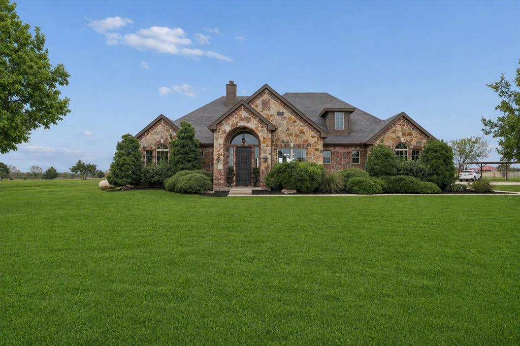 542 Pierce Road Red Oak, TX 75154 - Photo 21 of 27 Stone and brick facade residence with an arched entry and dormer window