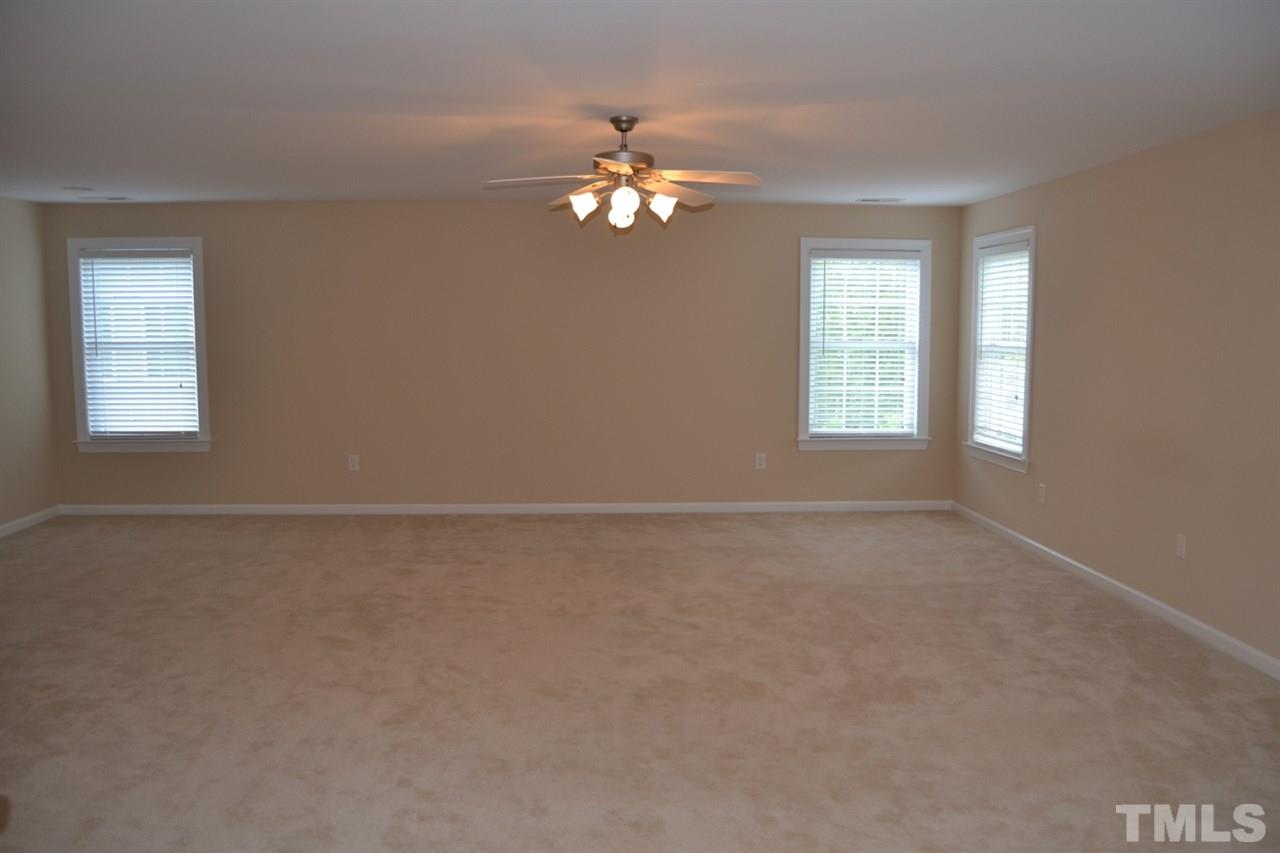 8425 Henderson Road Apex, NC 27539 - Photo 15 of 25 a view of empty room with window