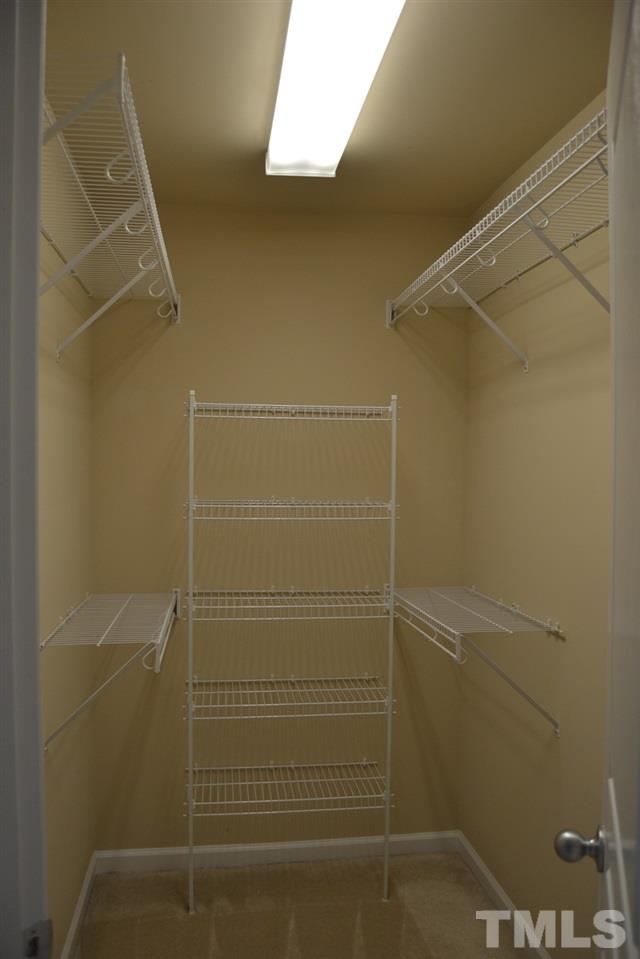 8425 Henderson Road Apex, NC 27539 - Photo 16 of 25 a bathroom with a shower