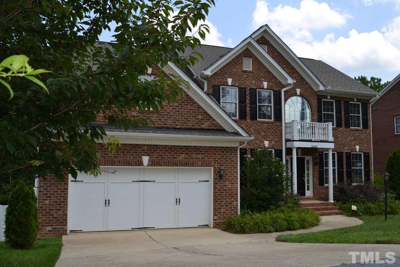 8425 Henderson Road Apex, NC 27539 - Photo 3 of 25 a front view of a house with garden