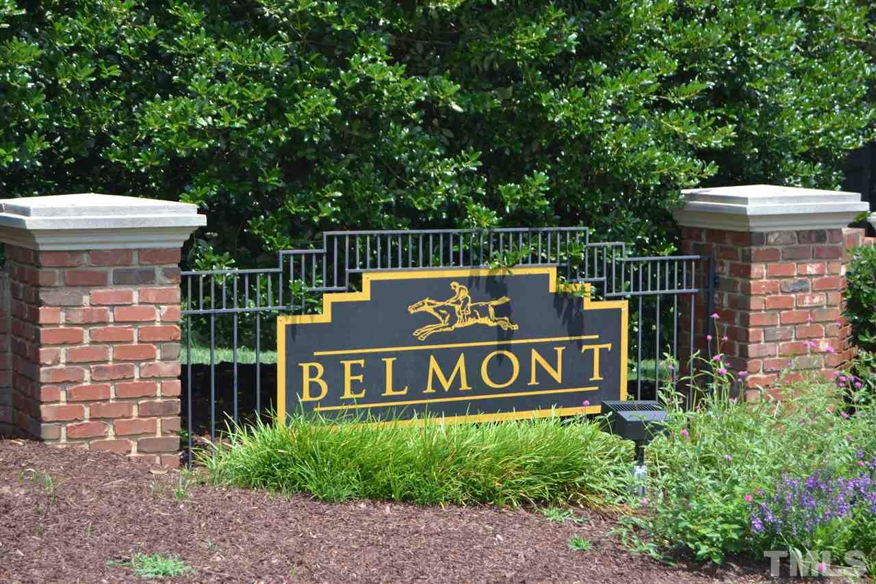 8425 Henderson Road Apex, NC 27539 - Photo 5 of 25 a sign that is sitting on a brick wall