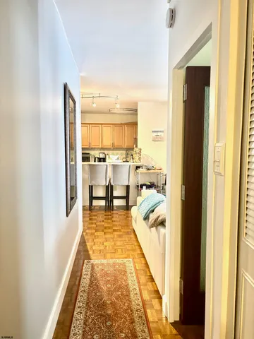 a view of a living room with a fireplace