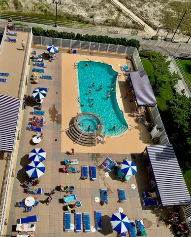 an aerial view of residential houses and outdoor space
