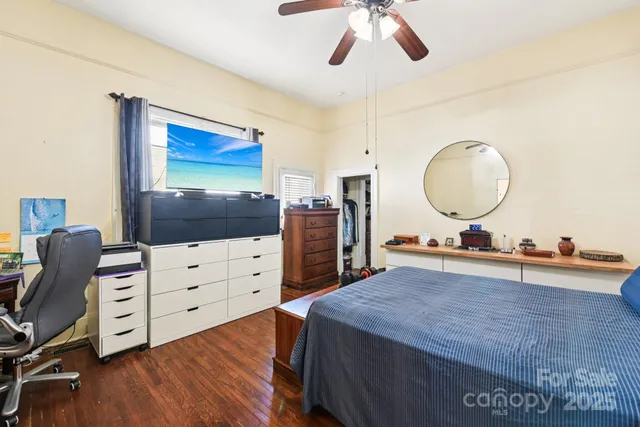 a bedroom with a bed and furniture