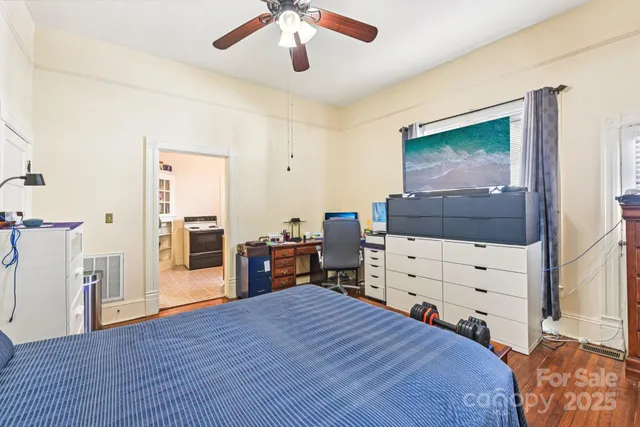 a bedroom with a bed and closet