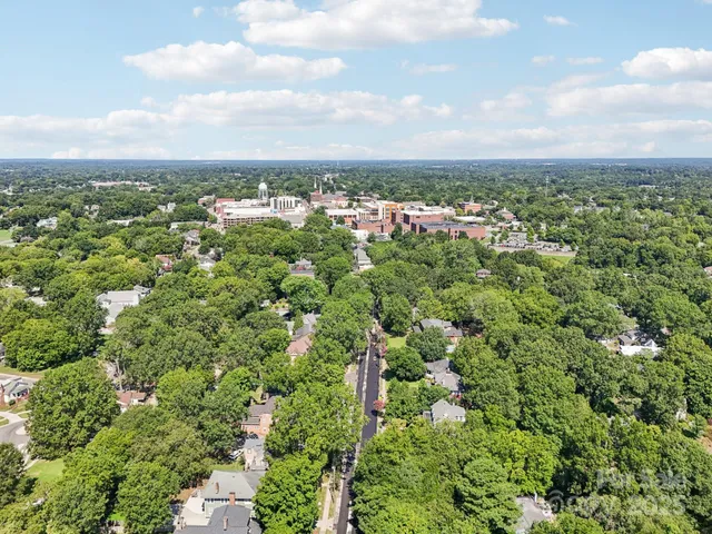 an aerial view of a city with lots of residential buildings